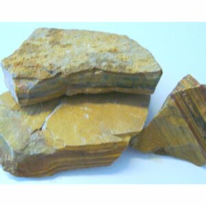 Jaspis fra Kjørholt ( Porsgrunn) Farge, stipet i brune og gule nyanser. Biter i størrelse 80 - 1400 gr. Pris er oppgitt pr. 100 gram.