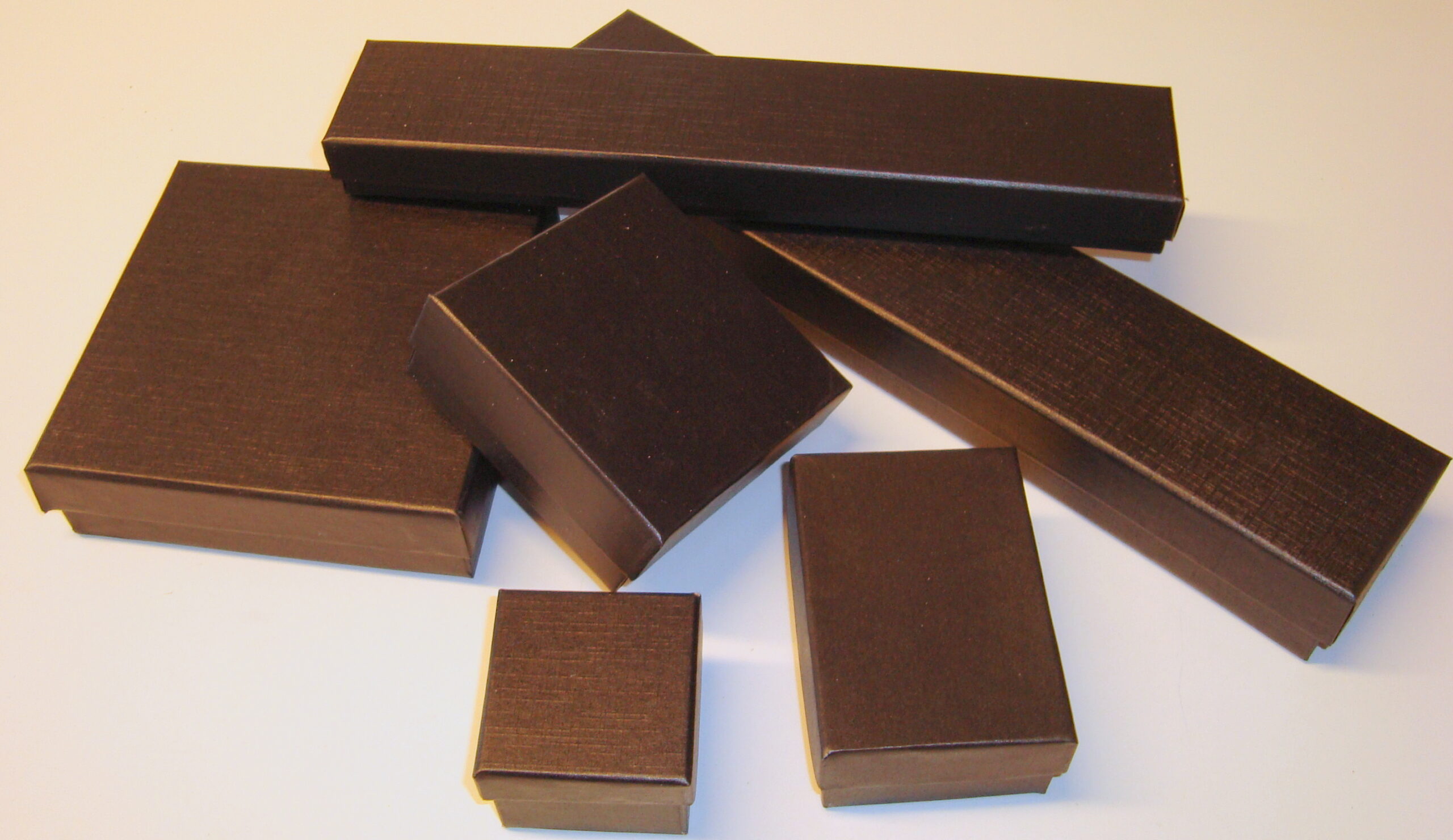 Gaveesker/knivesker i sort papp.