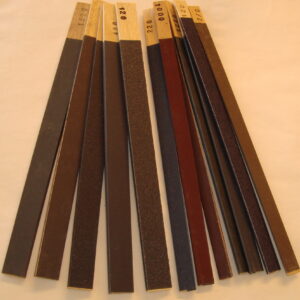 Pakke med 11 stk. smergelpinner. Flate og halvrunde.